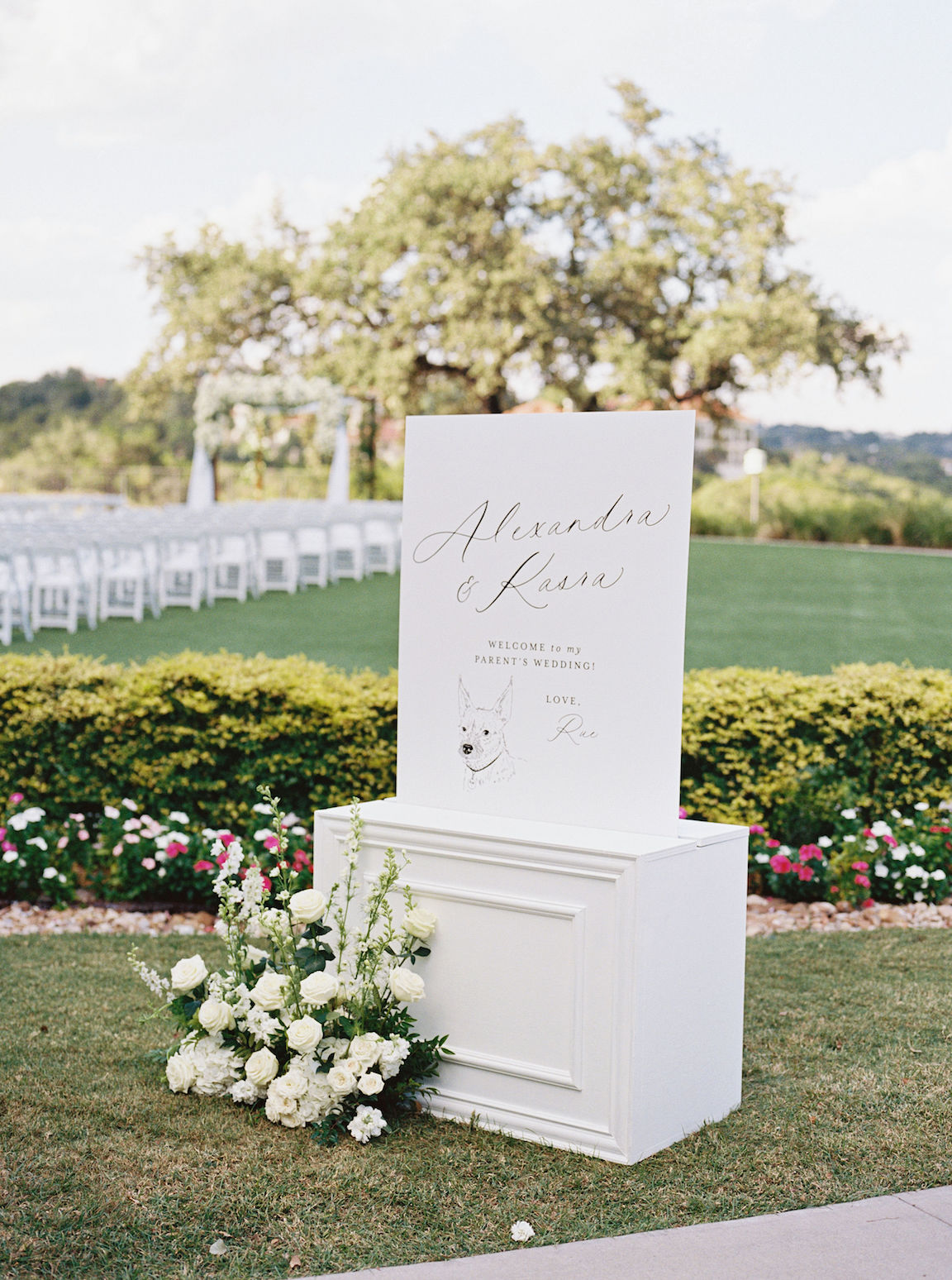 Omni Barton Creek Wedding ceremony on yard with lush white florals