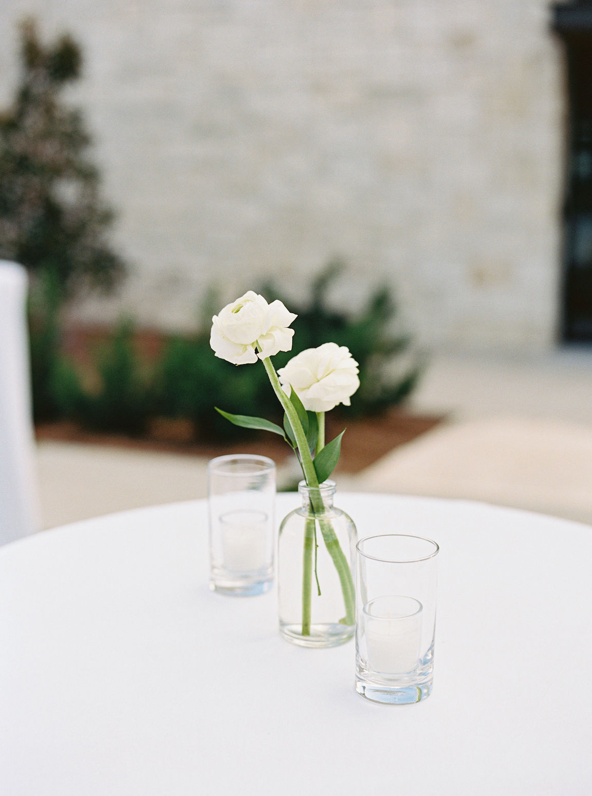 Omni Barton Creek Wedding cocktail hour on yard with lush white florals