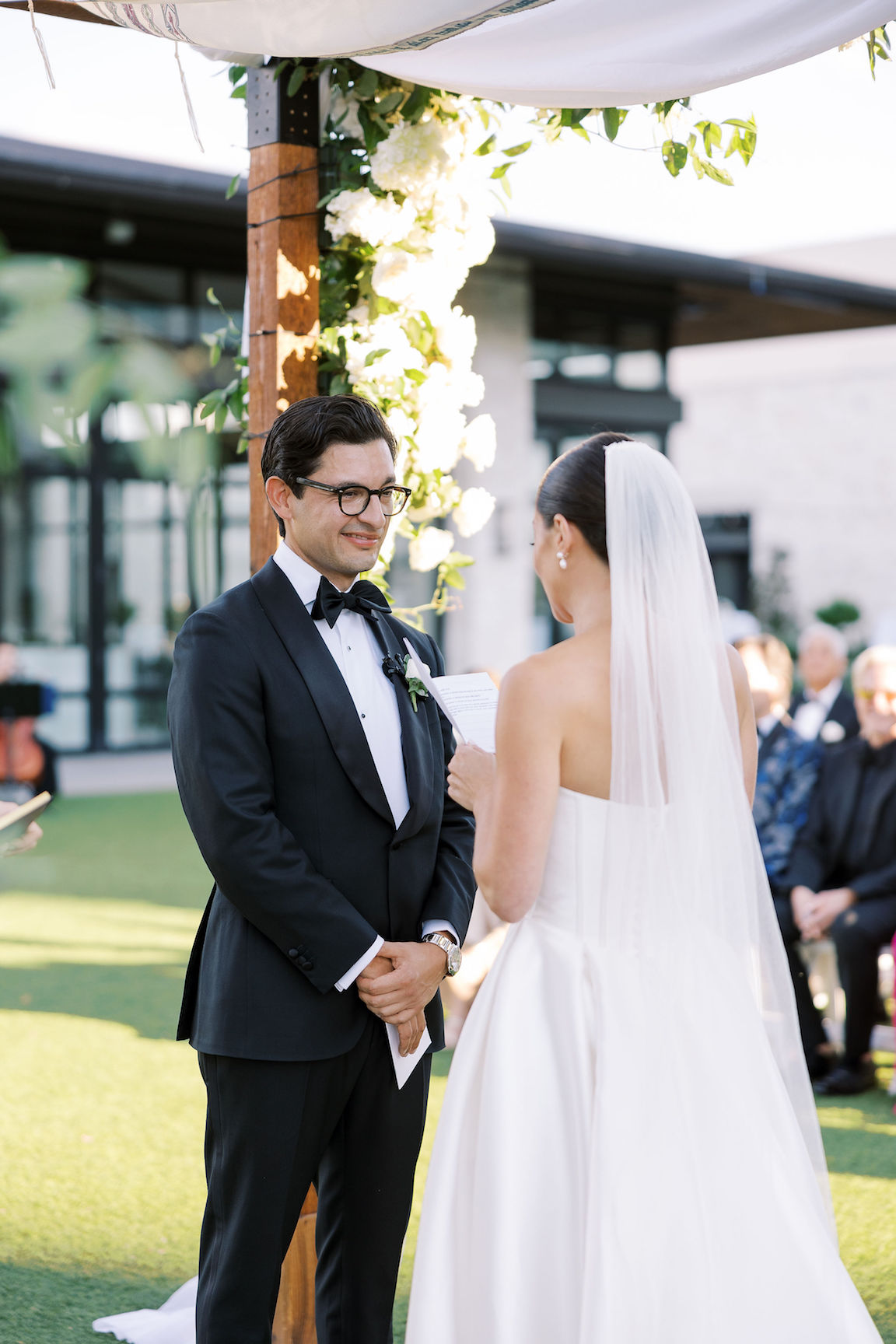 Omni Barton Creek Wedding ceremony on yard with lush white florals