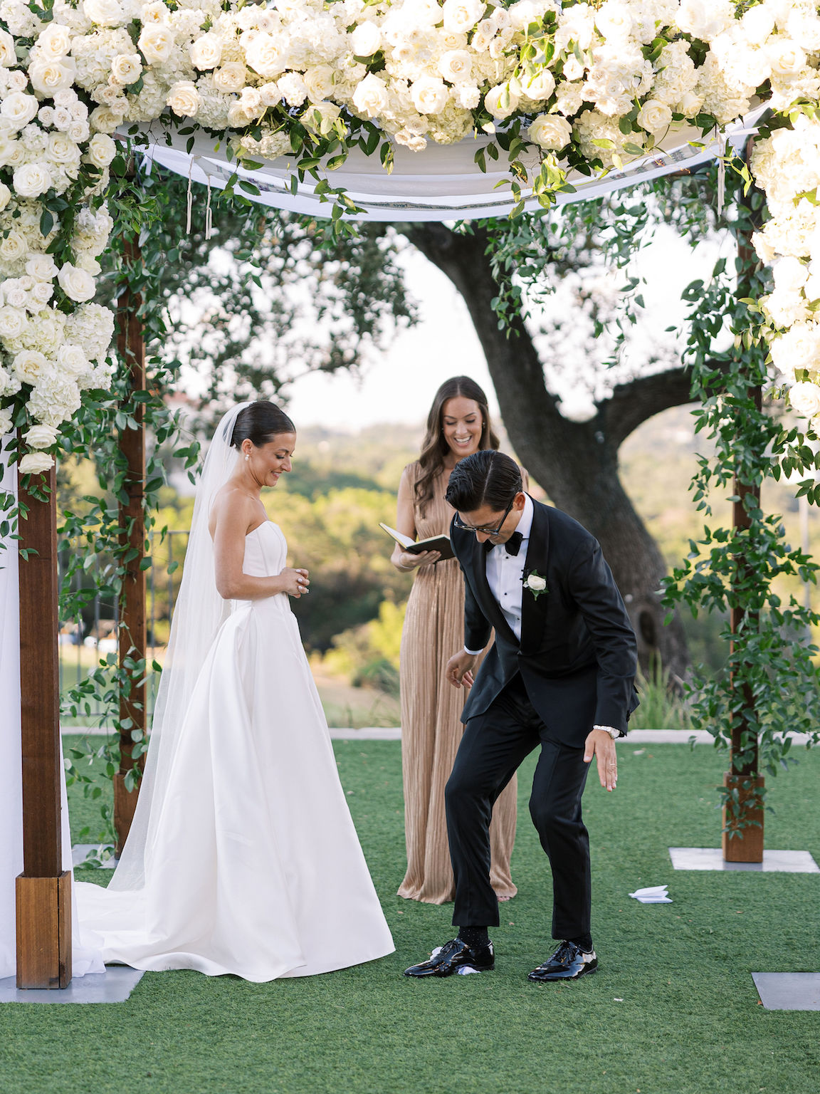 Omni Barton Creek Wedding ceremony on yard with lush white florals