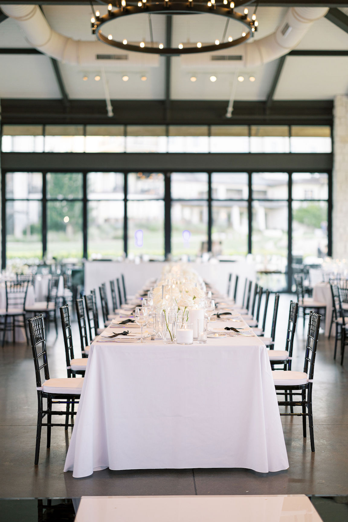 elegant Omni Barton Creek Wedding reception details with lush white florals