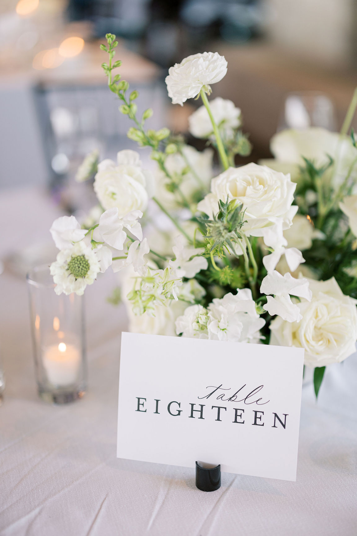 elegant Omni Barton Creek Wedding reception details with lush white florals