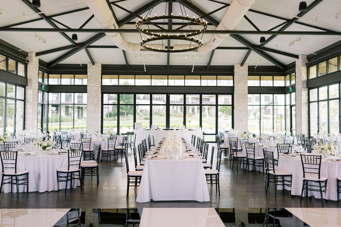 elegant Omni Barton Creek Wedding reception details with lush white florals