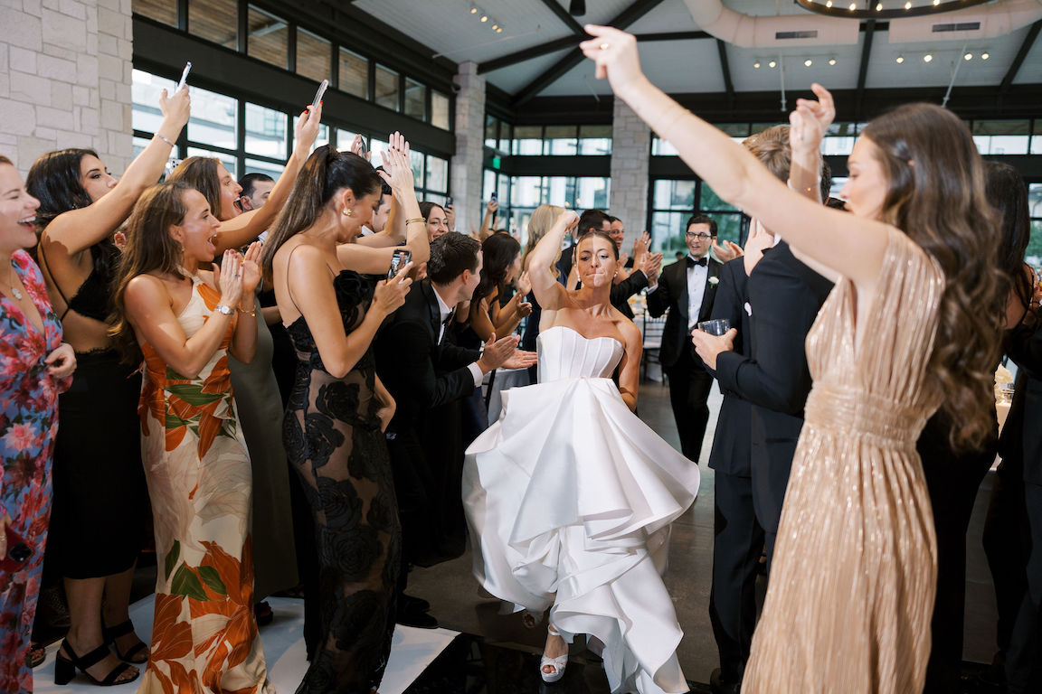elegant Omni Barton Creek Wedding reception entrance bride and groom