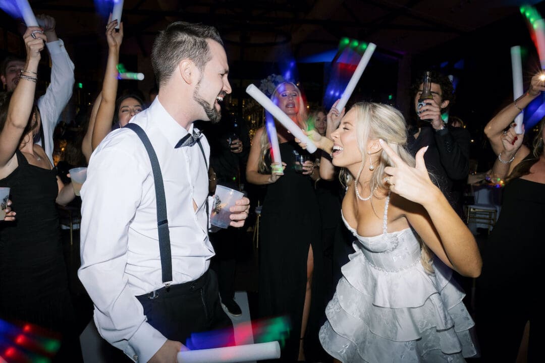Packed dancefloor at Omni Barton Creek wedding with live band and joyful guests celebrating