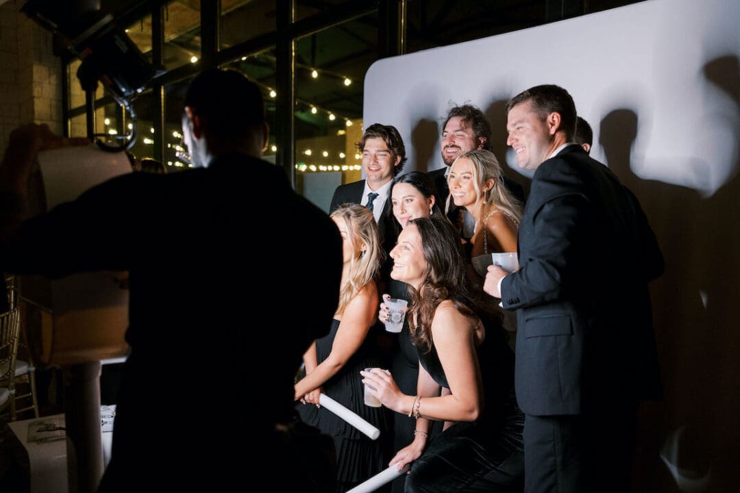 Packed dancefloor at Omni Barton Creek wedding with live band and joyful guests celebrating
