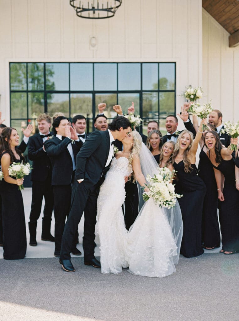 Candid laughter during wedding party photos at Dos Palomas Ranch