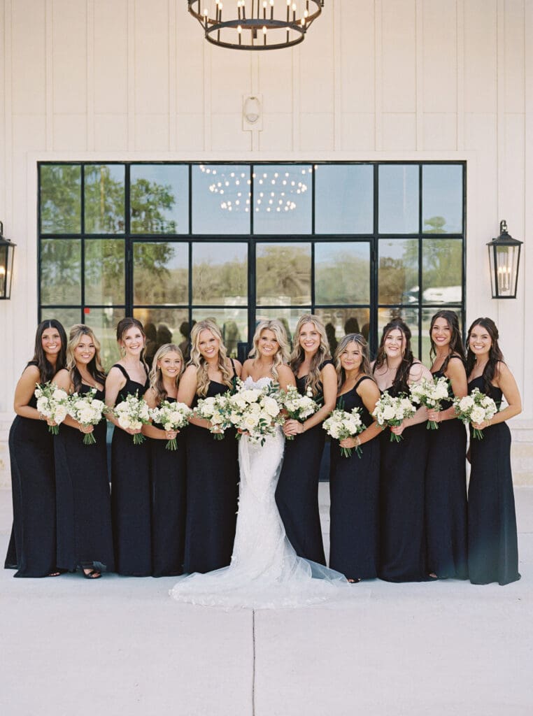 Candid laughter during wedding party photos at Dos Palomas Ranch