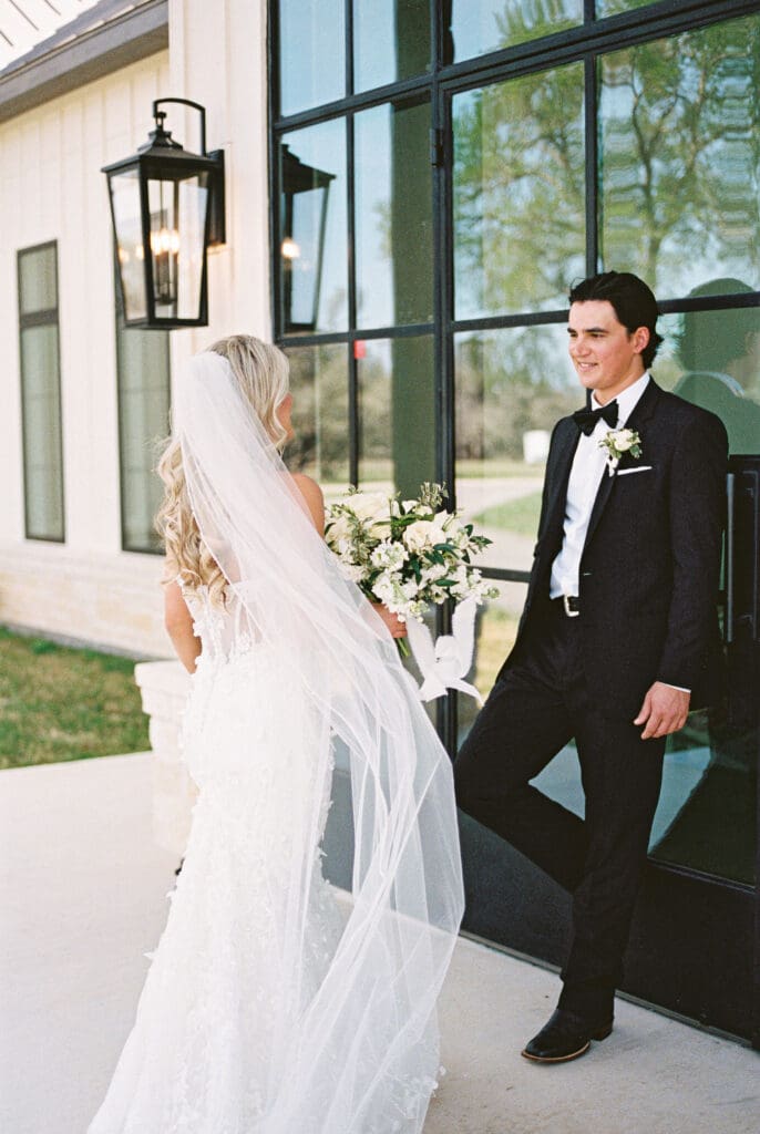 Candid laughter during bride and groom portraits at Dos Palomas Ranch