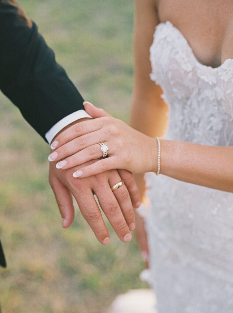 Bride and groom embracing at sunset at Dos Palomas Ranch wedding