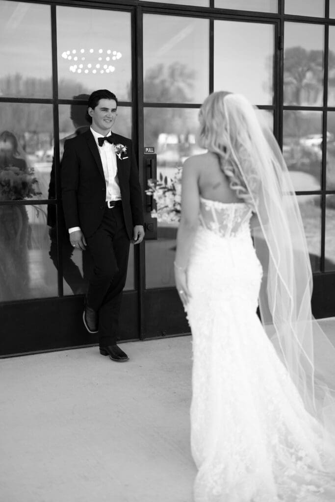Candid laughter during bride and groom portraits at Dos Palomas Ranch