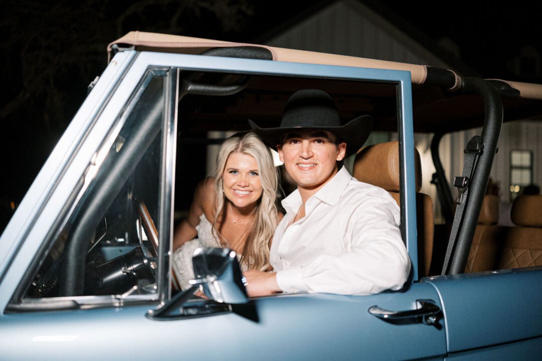 Bronco exit car with bride and groom at Dos Palomas Ranch wedding photographed by Diana Brewer