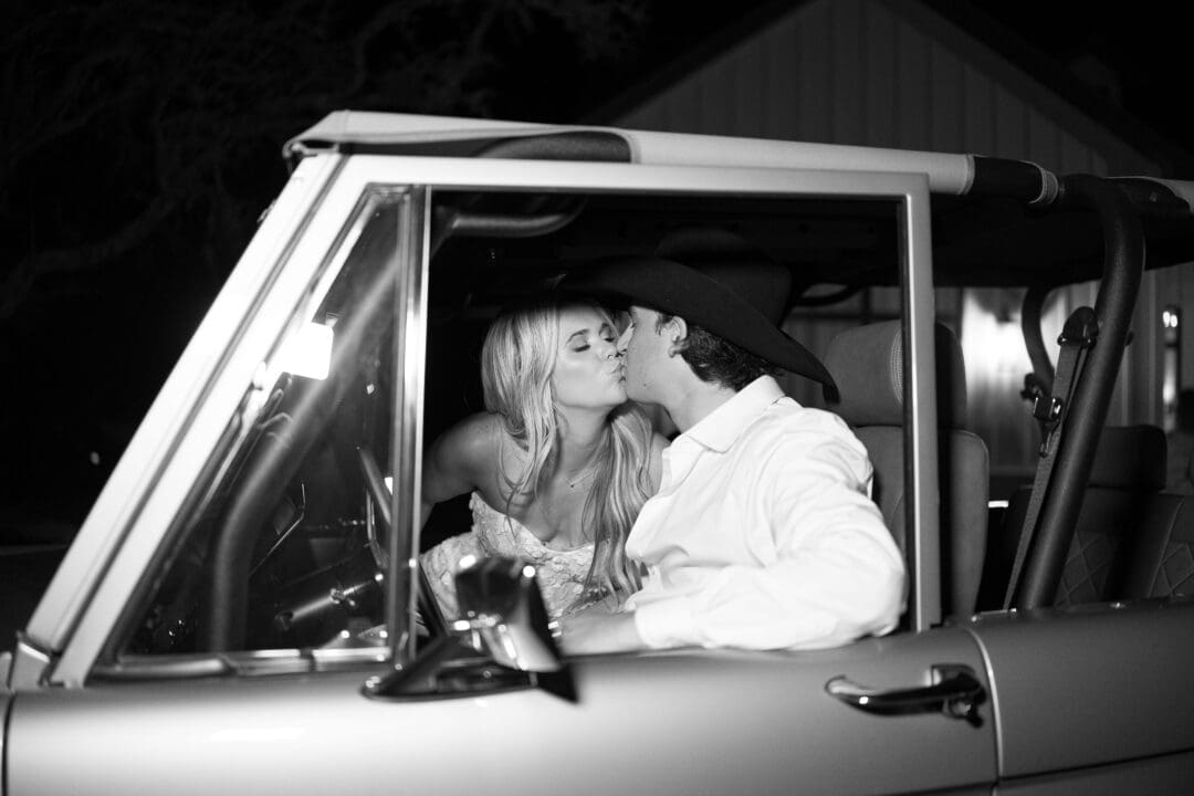 Bronco exit car with bride and groom at Dos Palomas Ranch wedding photographed by Diana Brewer
