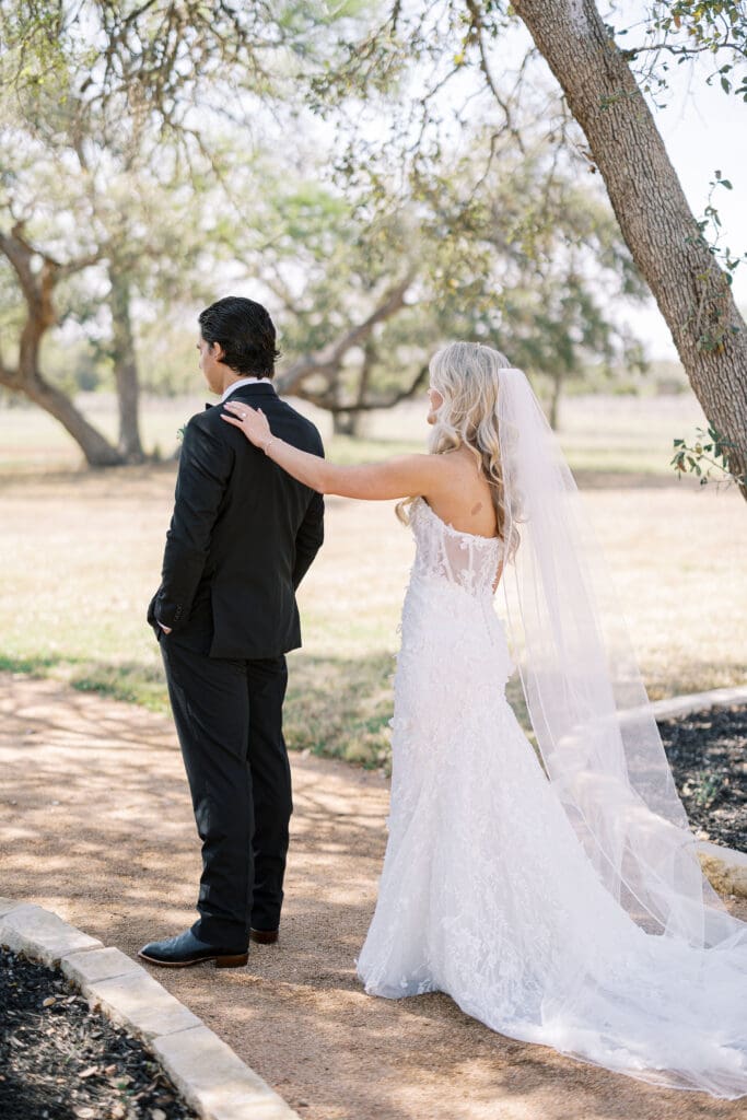 Elegant Dos Palomas Ranch wedding bride and groom first look