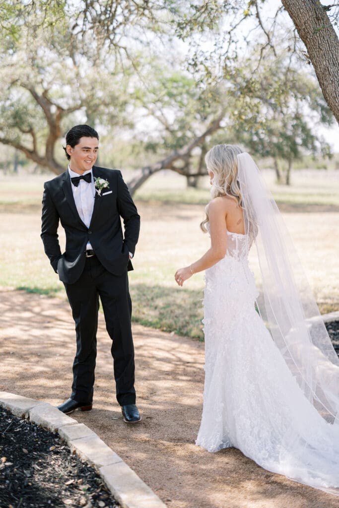 Elegant Dos Palomas Ranch wedding bride and groom first look