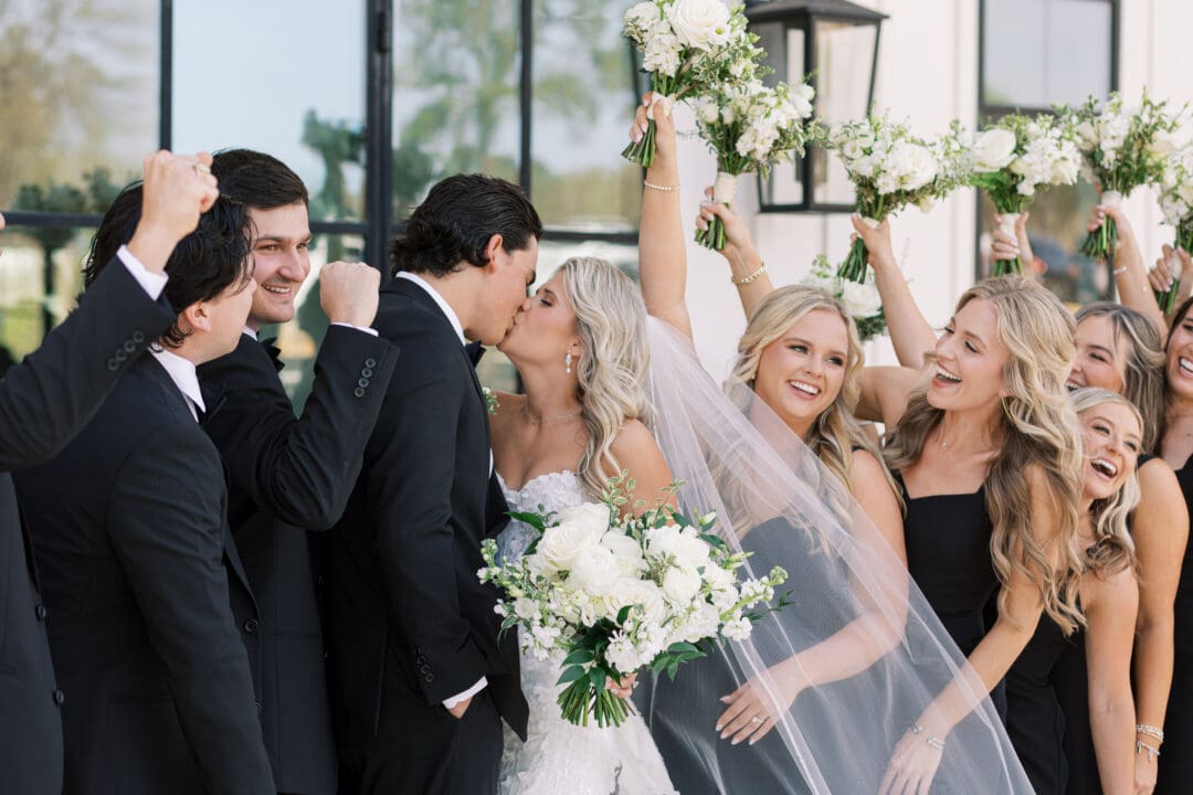 Candid laughter during wedding party photos at Dos Palomas Ranch