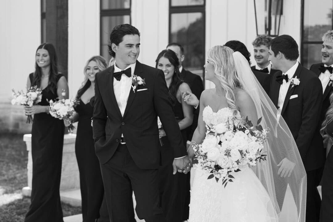 Candid laughter during wedding party photos at Dos Palomas Ranch