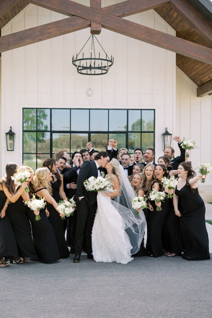 Candid laughter during wedding party photos at Dos Palomas Ranch