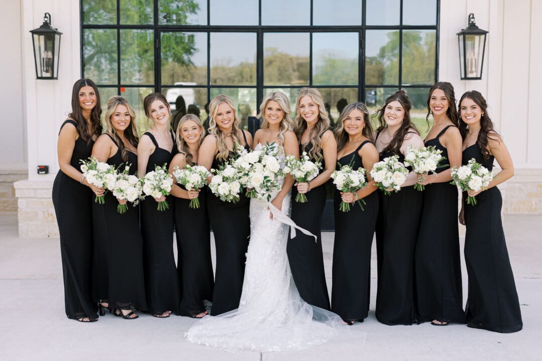 Candid laughter during wedding party photos at Dos Palomas Ranch