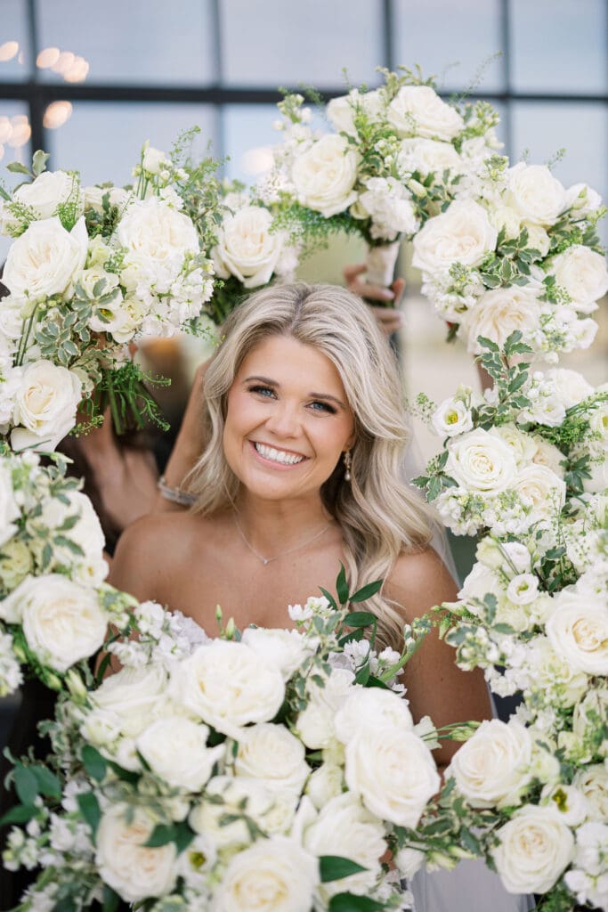 Candid laughter during wedding party photos at Dos Palomas Ranch