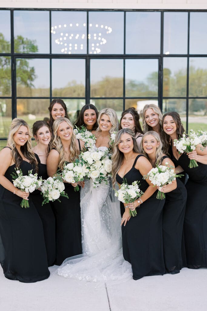 Candid laughter during wedding party photos at Dos Palomas Ranch