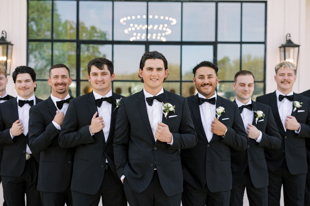 Candid laughter during wedding party photos at Dos Palomas Ranch