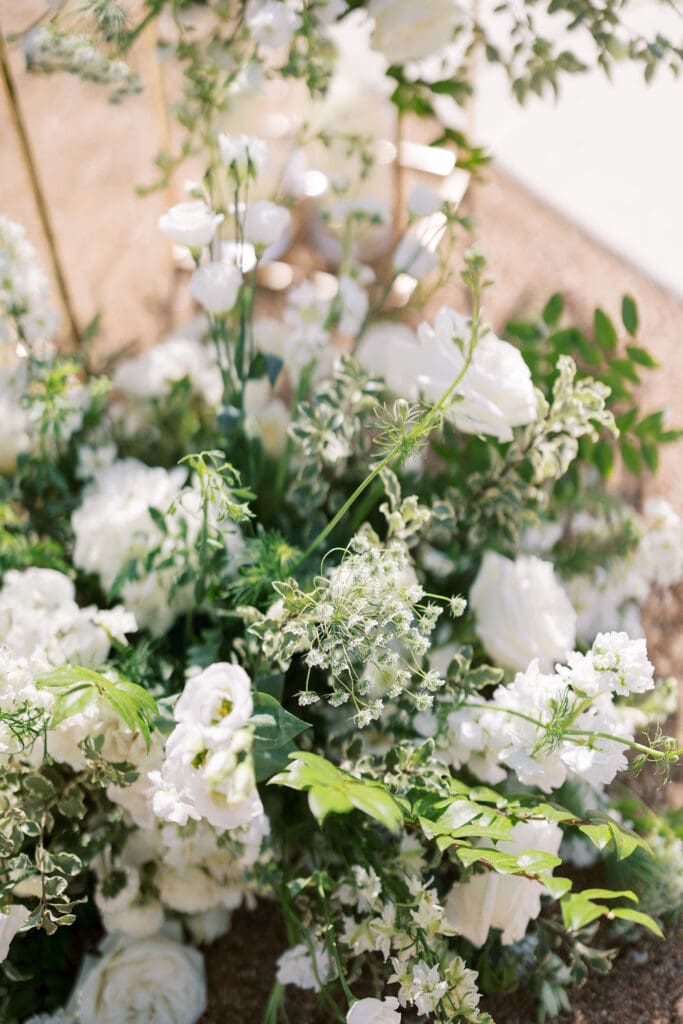 Timeless wedding photography with lush florals at Dos Palomas Ranch