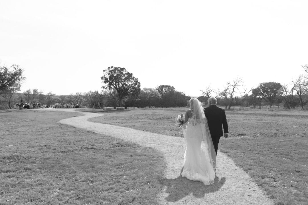 romantic ceremony with lush florals at Dos Palomas Ranch