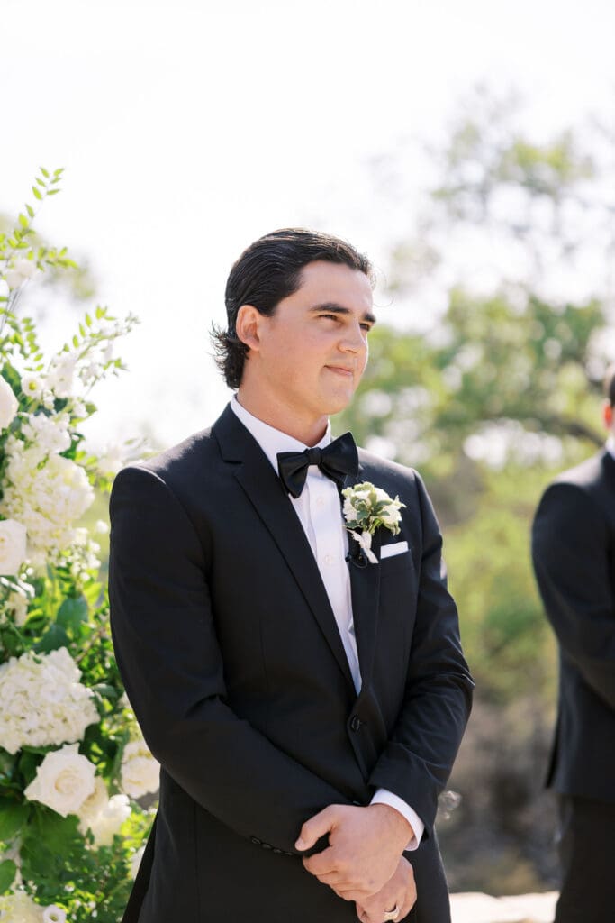 romantic ceremony with lush florals at Dos Palomas Ranch