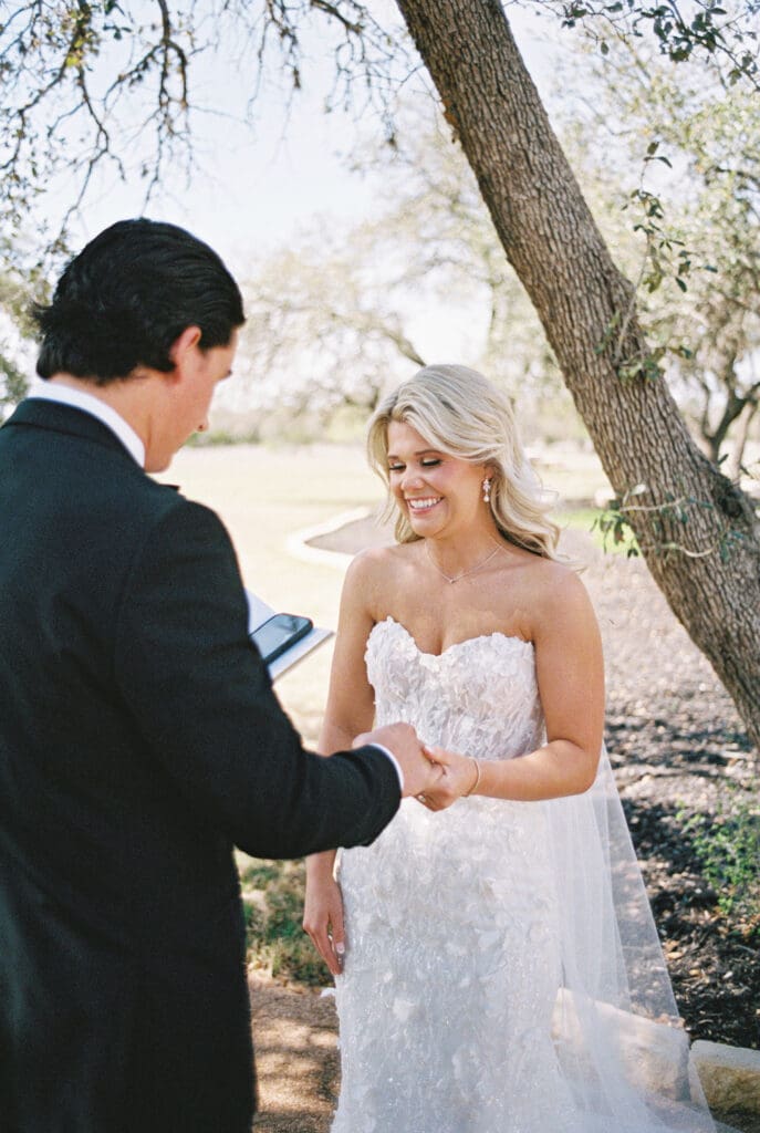Candid laughter during bride and groom portraits at Dos Palomas Ranch