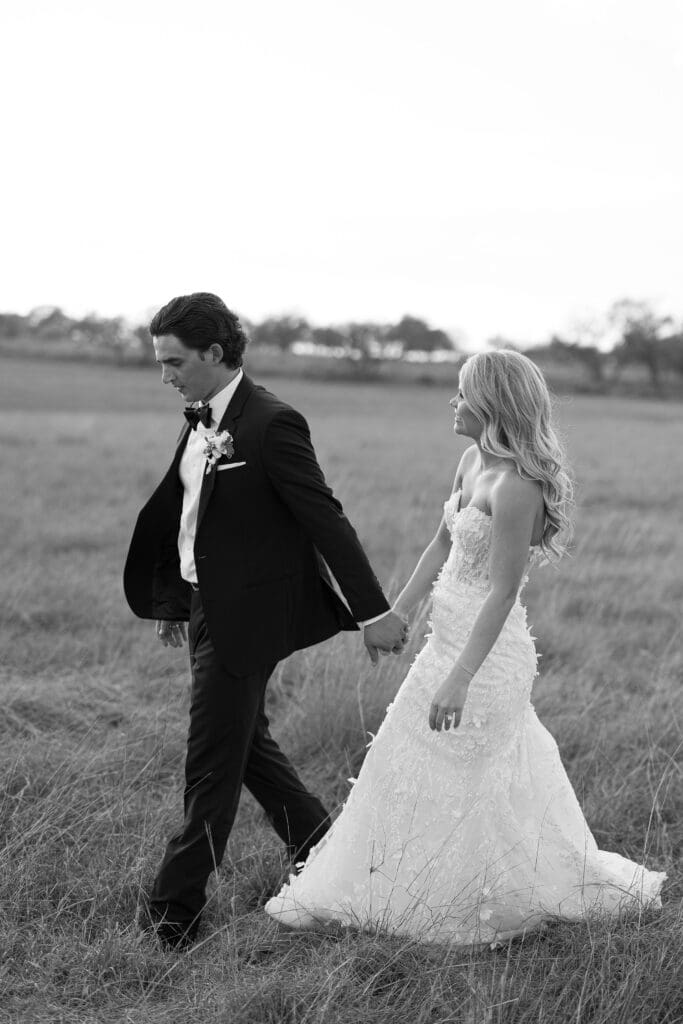 Bride and groom embracing at sunset at Dos Palomas Ranch wedding