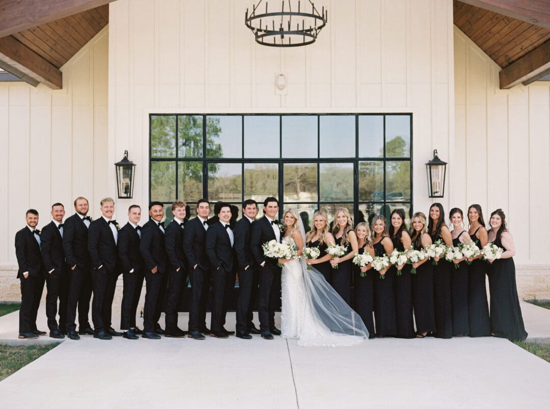 Candid laughter during wedding party photos at Dos Palomas Ranch