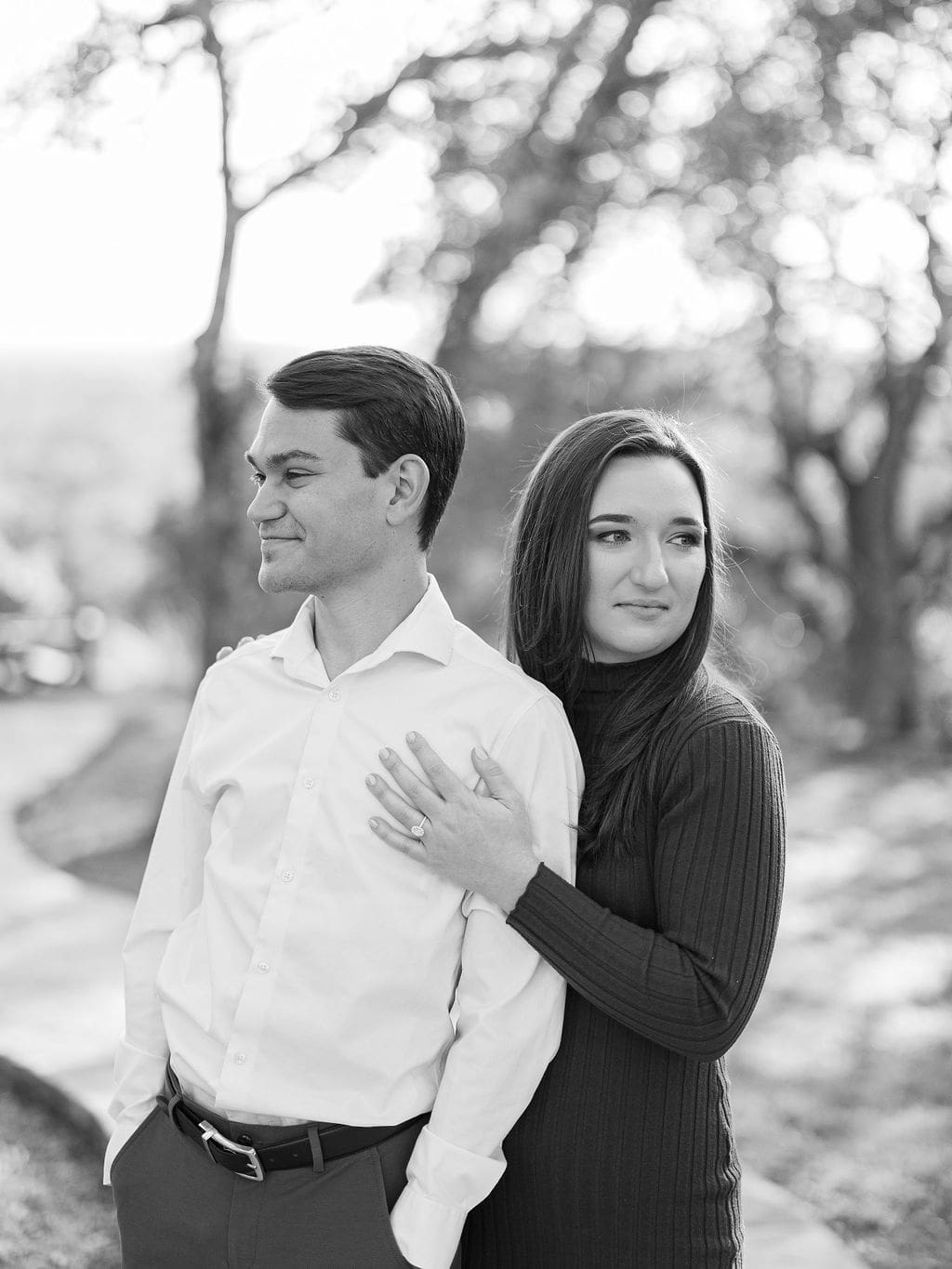 Couple embracing at family home during Wimberley engagement session
