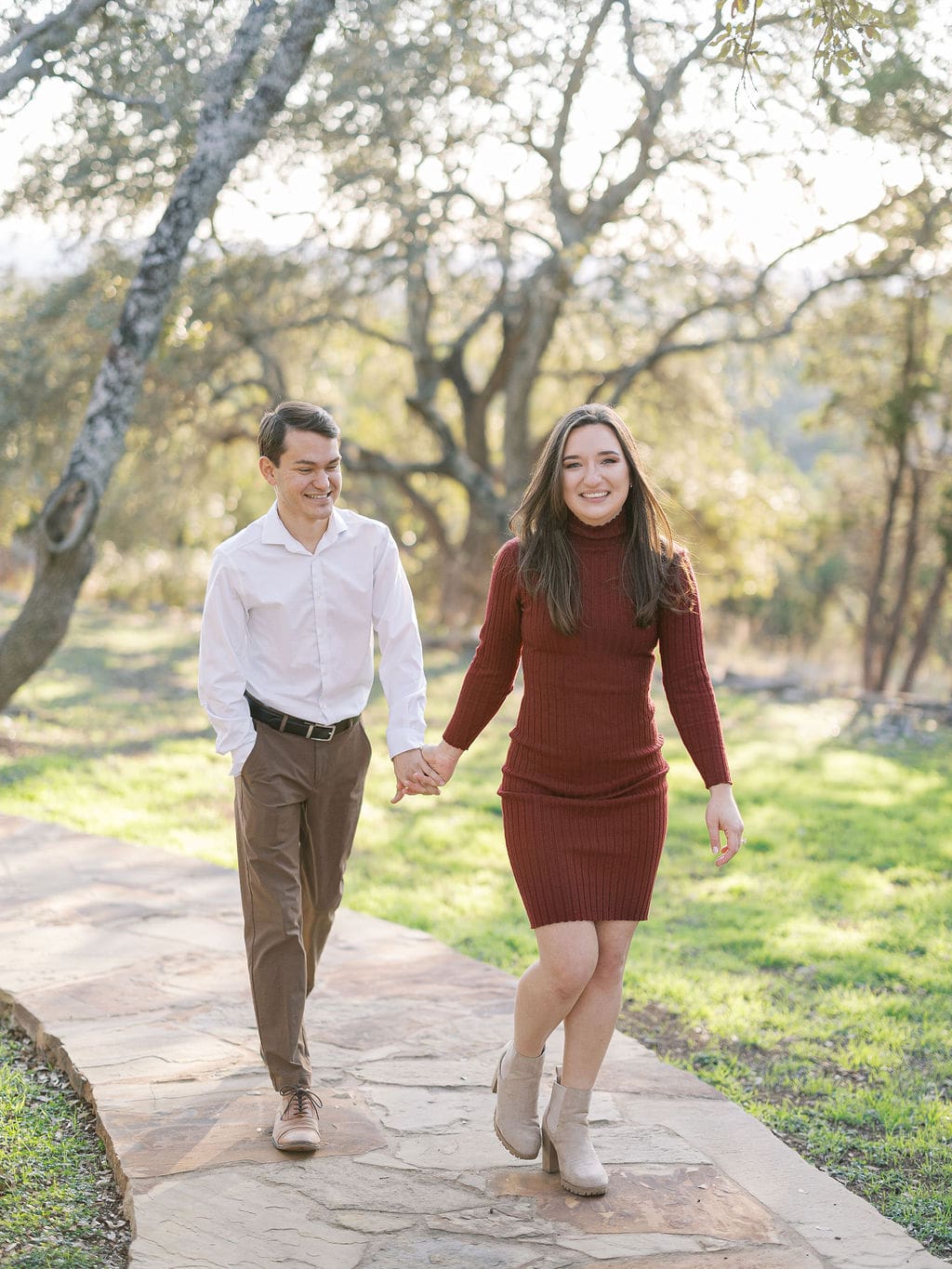 Couple embracing at family home during Wimberley engagement session