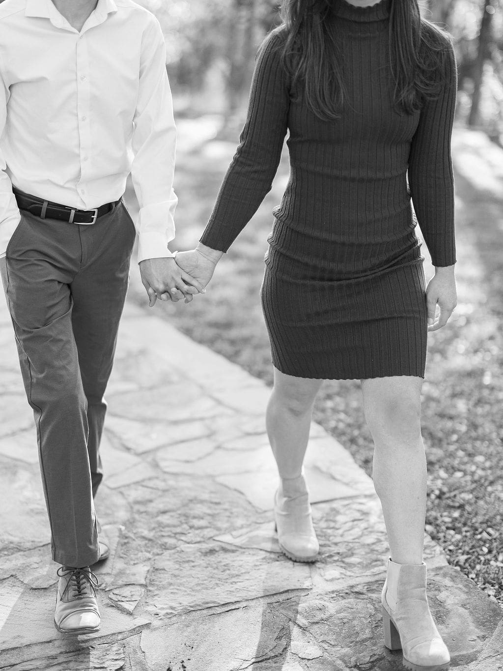 Couple embracing at family home during Wimberley engagement session