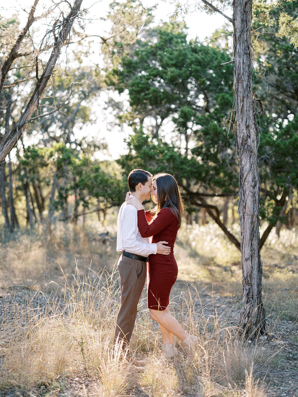 Romantic golden hour engagement portraits in Wimberley Texas