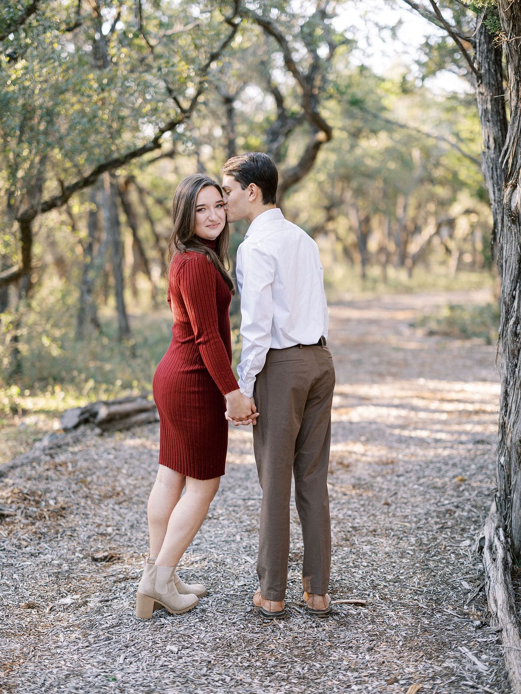 Candid engagement moment in Wimberley captured on film